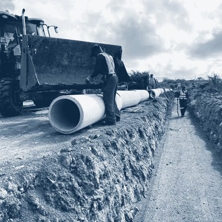 Pipeline being laid along a trench
